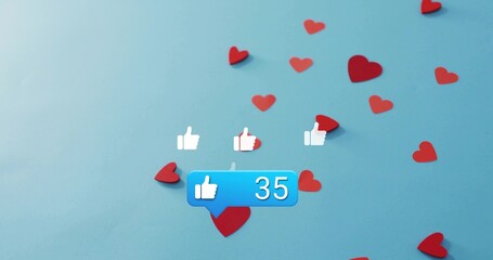 Floating blue bubble showing thumbs-up 35 on tabletop, with red hearts and white thumbs-up icons