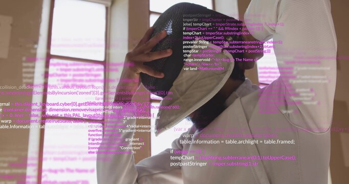 Lifting Indian fencer in white jacket in studio raising black mask with gloved hand, code overlays - Powered by Adobe
