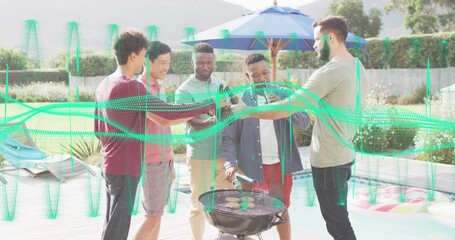 Clinking five men in summer clothes raising beer bottles poolside with blue umbrella tending grill