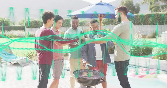 Clinking five men in summer clothes raising beer bottles poolside with blue umbrella tending grill