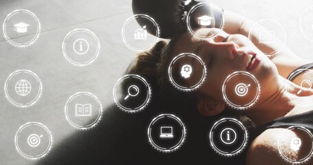 Lying female sweating on gym mat, wearing dark tank top, black ball, HUD overlays, copy space