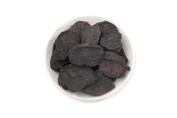 Dried He Shou Wu Black Root Chinese Herbal Medicine in White Bowl Traditional Health Preparation