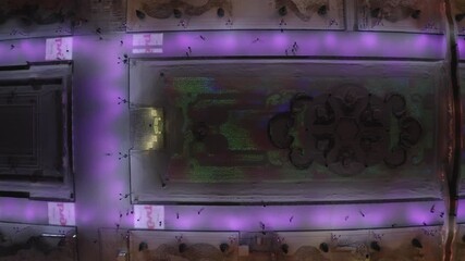 Vertical drone shot sliding across winter square - Powered by Adobe