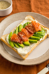 Salmon toast with avocado and cream cheese, breakfast, healthy food