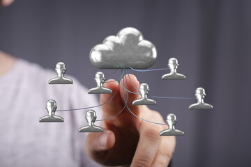 Abstract concept of cloud computing, network and data security. Hand interacting with cloud icon and connected