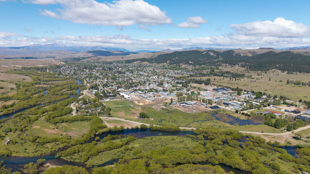Aerial view of the City of "Junin de los Andes", Neuquen, Argentina.Aerial view of the City of "Junin de los Andes", Neuquen, Argentina. Close-up of the Chimehuin River