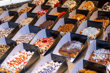 Delicious Waffles in Belgium, soft cakes with chocolate cream and fruits in Brussels, a local delicatesse