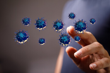 Close up shot of virus cells floating near human finger, concept of health, illness, healthcare. Covid-19 illu