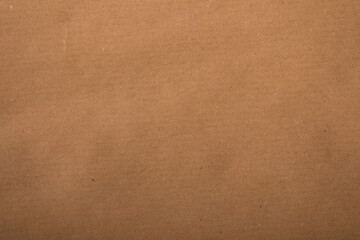 Close up of textured brown cardboard, perfect as background for design, websites, posters, presentations. Prov