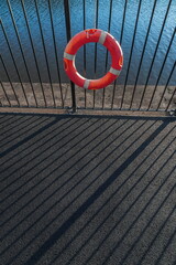 Long shadows of metal railings 
