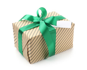 Gift box with green ribbon and blank card isolated on white