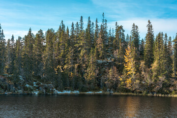 By the Veltfiskelausen Lake of the Toten&aring;sen Hills with a view towards the hilltopp of Bygdeborgen Borgen.