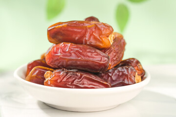Golden Dried Dates Fruit in White Bowl - Healthy Natural Snack Food Photography