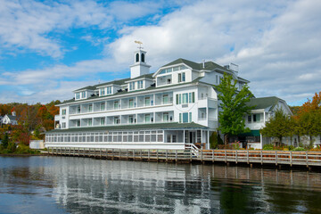 Bay Point at Mill Falls by Lake Winnipesaukee in fall in historic town center of Meredith, New Hampshire NH, USA. 