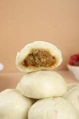 Fresh Handmade Steamed Buns with Savory Meat and Scallion Filling - Traditional Asian Cuisine