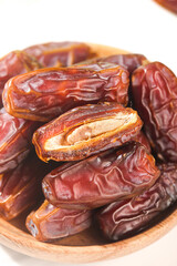 Golden Dates Dried Fruits in Wooden Bowl - Healthy Natural Snack Food Photography