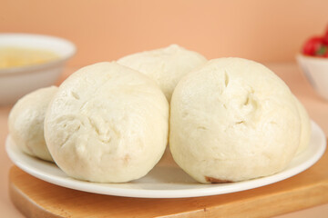 Handmade Fresh Pork Buns with Scallion - Traditional Asian Steamed Dumplings on White Plate