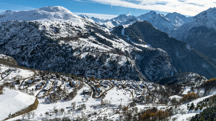 View of the snow-covered mountains in winter from Huez