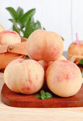 Fresh Yangshan Peaches on Wooden Board - Premium Chinese Stone Fruit Display
