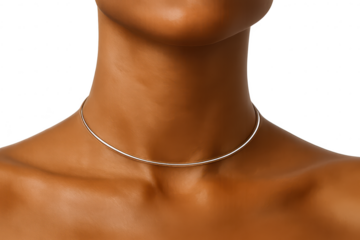 Delicate gold choker necklace on a woman's neck, isolated on transparent background.