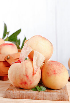 Fresh Yangshan Peaches Sliced on Wooden Board - Ripe Summer Stone Fruit