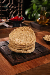Crispy Spiced Tofu Patties Stack on Wooden Board - Healthy Vegetarian Protein Food Photography