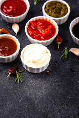 Set of different sauces. Ketchup, mustard, pesto