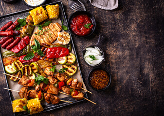 Assortment of grilled bbq meat and vegetables