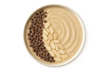 Creamy smoothie bowl with chocolate chips and almonds, transparent background.