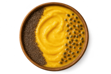 Vibrant yellow smoothie bowl with chia and passion fruit, transparent background