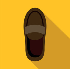 Obraz premium Brown loafer shoe with shadow on a yellow uniform background