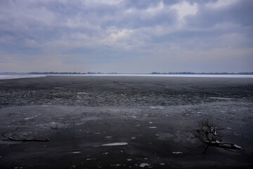 Frozen lake in winter time