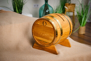 Fototapeta premium wooden barrel with wine and grapes