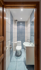 Small Bathroom Interior Featuring White Fixtures and Stylish Ceramic Tile Walls