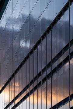 Architecture facade glass reflection abstract geometry corporate modern lines pattern shaping a dynamic corporate identity through modern visual structure