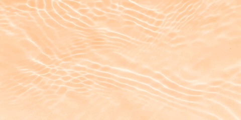 Natural sand dune texture background with abstract wind-blown ripples and waves on a dry, summer beach