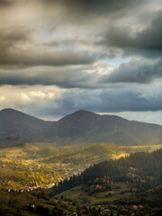 Sunny Autumn Carpathians with Puffy White Clouds