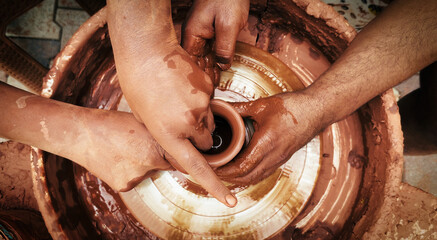 Working With Clay Pot in Ceramic Workshop