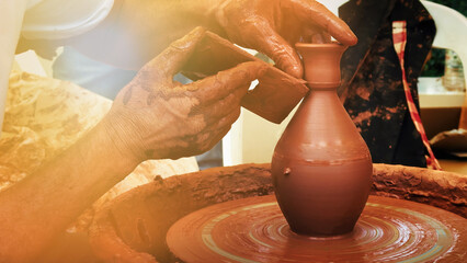 Working With Clay Pot in Ceramic Workshop