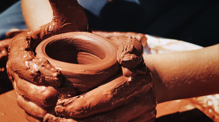 Working With Clay Pot in Ceramic Workshop