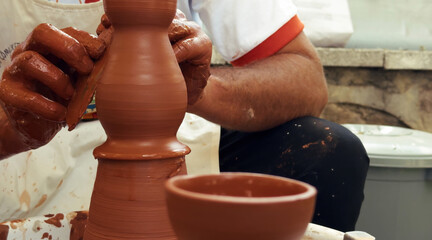 Working With Clay Pot in Ceramic Workshop