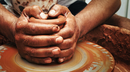 Working With Clay Pot in Ceramic Workshop