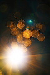 Fototapeta premium Abstract Natural Sun flare or Far star on the black background