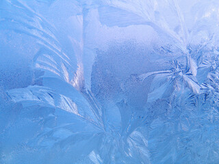 Beautiful ice pattern on window gass, natural winter texture