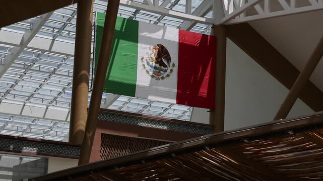 interior of tulum airport mexico flag (mexican transport hub) new construction transportation flight air travel tourism riviera maya destination ceiling skylight