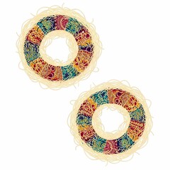 Vibrant, ornate dessert rings adorned with intricate paisley patterns offer a delightful culinary and decorative visual appeal.