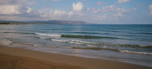 Idyllic atmosphere: a perfect Mediterranean day showcasing crystal blue sea and clouds