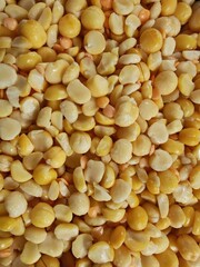 Soaked peas in warm natural tones, close-up food texture background for cooking preparation