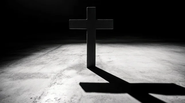 High-Contrast Black and White Cross with Partial Shadow