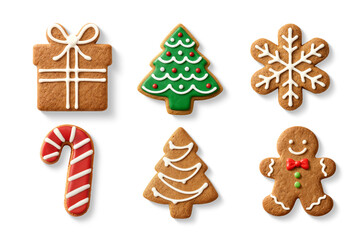 et of decorated Christmas gingerbread cookies in different shapes isolated on a transparent background, including Christmas tree, gingerbread man, candy cane and snowflakes PNG. High resolution. 